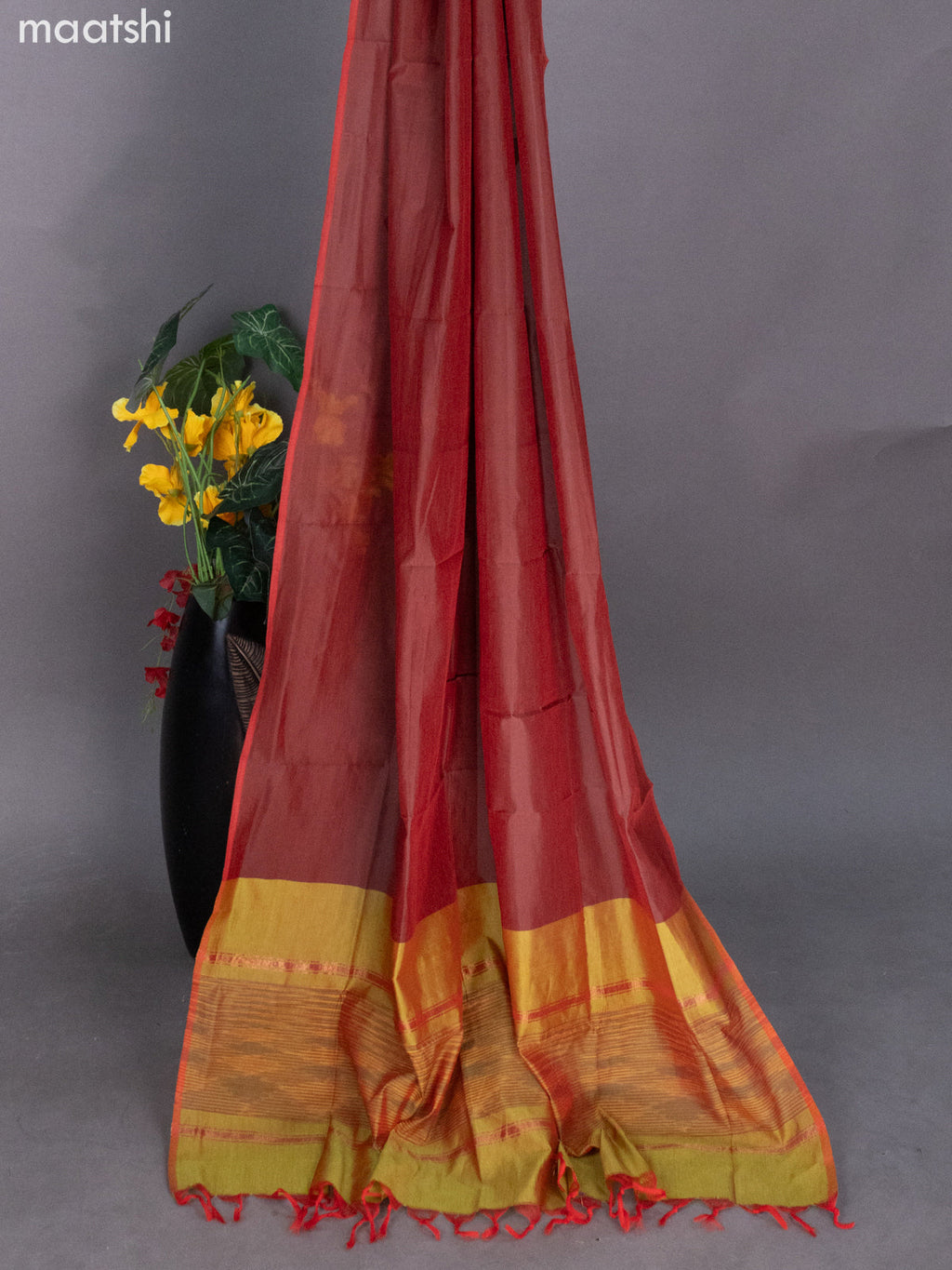 Dual Shade Of Green and Maroon Ikat Dress Material With Ikat Weaves