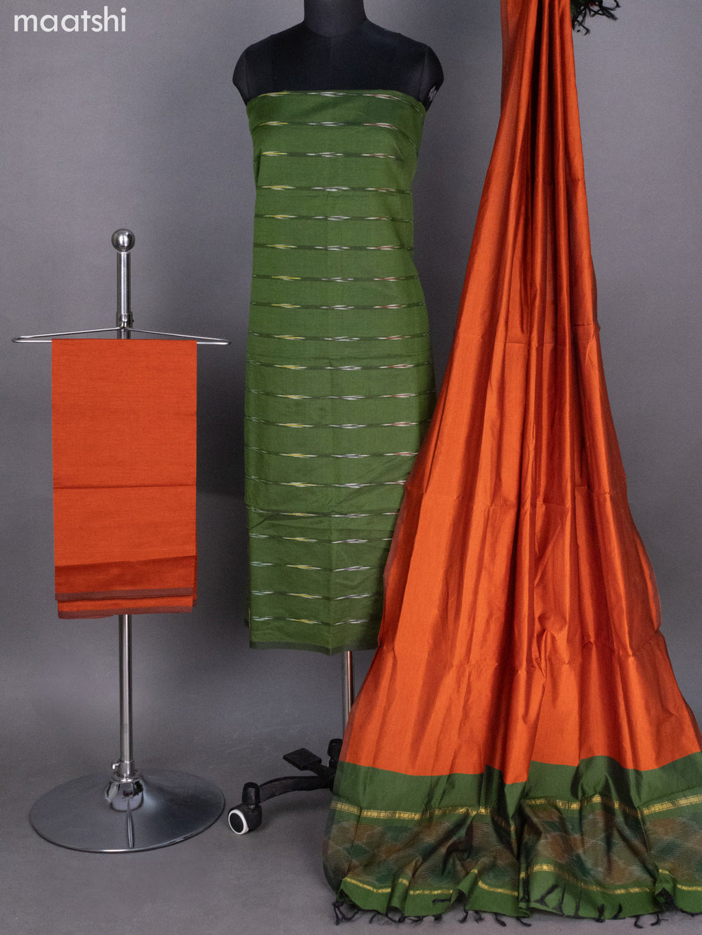 Sap Green and Rust Shade Ikat Dress Material With Allover Ikat Weaves