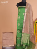 Green and Dark Sandal Semi Silk Cotton Dress Material With Zari Buttas and Bottom & Dupatta