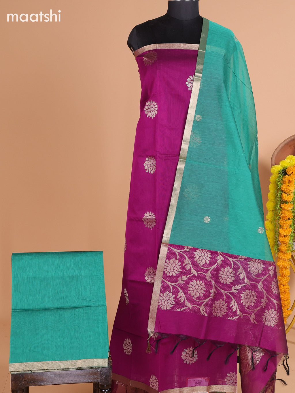 Purple and Teal Green Semi Silk Cotton Dress Material With Zari Buttas and Bottom & Dupatta