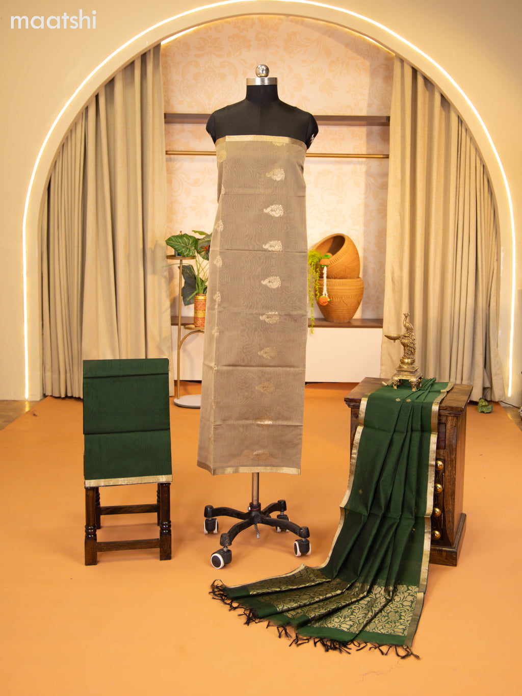 Biege and Green Semi Silk Cotton Dress Material With Zari Buttas and Bottom & Zari Dupatta