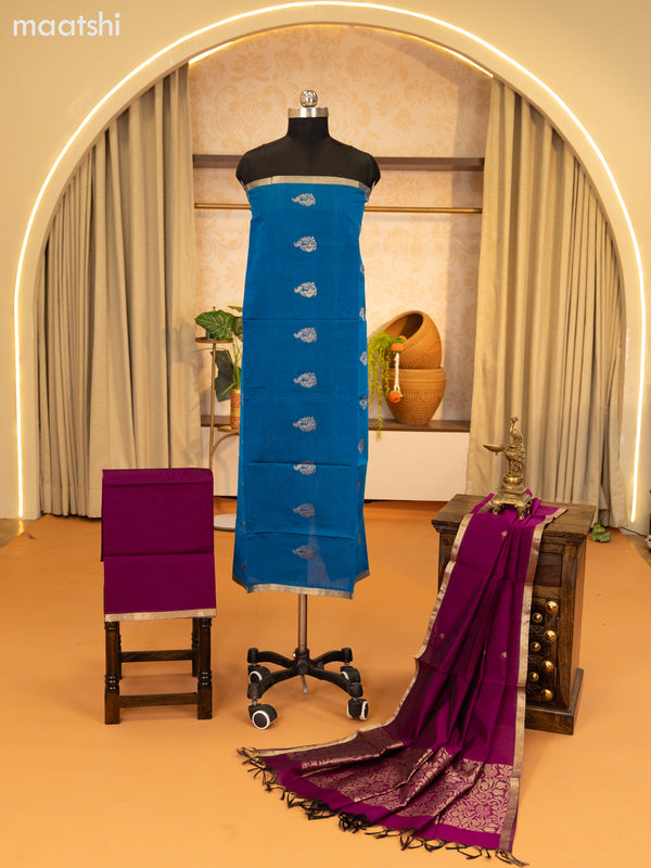 Peacock Blue and Magenta Pink Semi Silk Cotton Dress Material With Zari Buttas and Bottom & Zari Dupatta