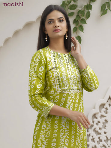 Cotton salwar suit light green and off white with allover batik prints & embroidery lace work neck pattern and straight cut pant & dupatta