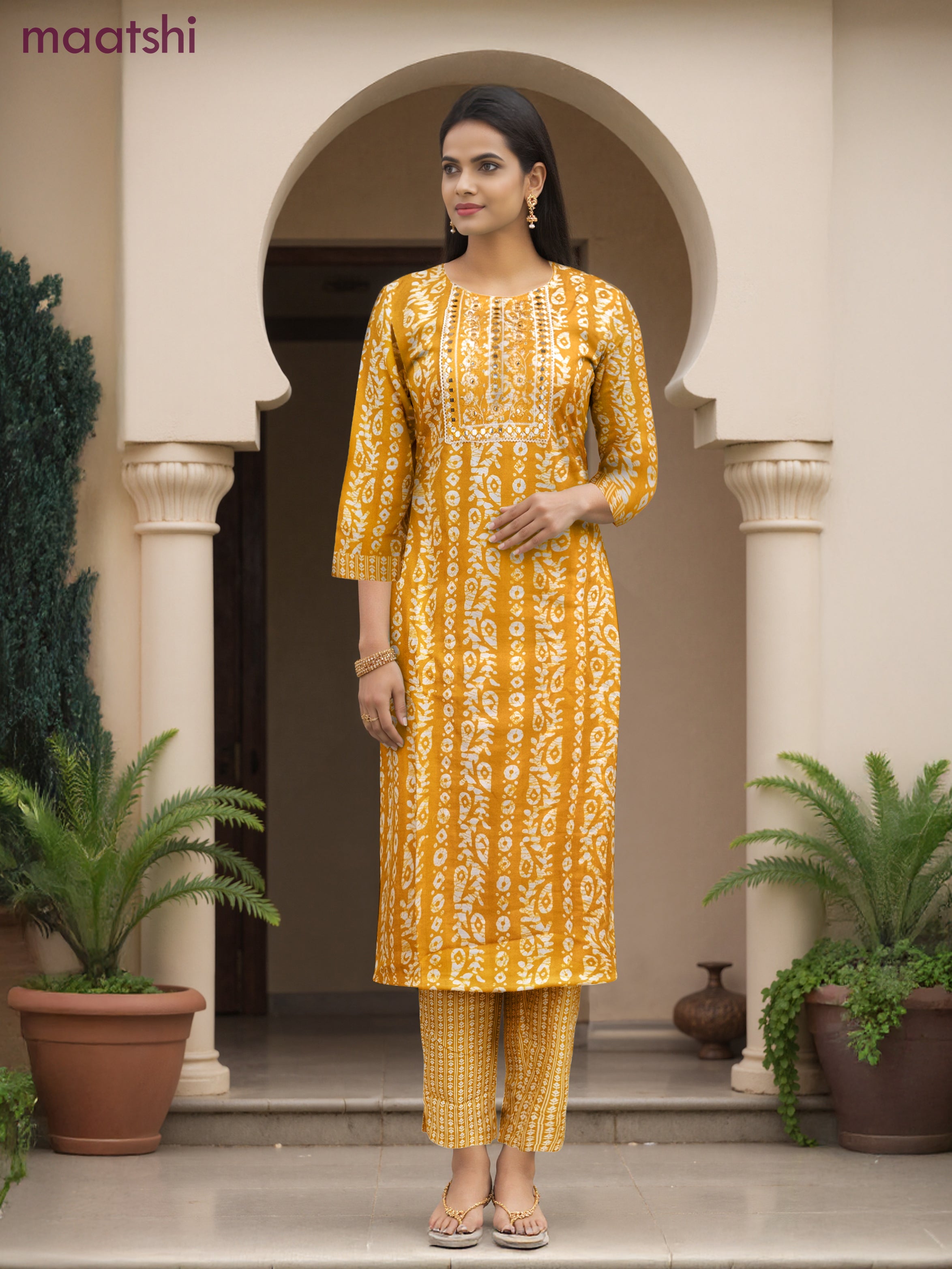 Cotton salwar suit mango yellow and off white with allover batik prints & embroidery lace work neck pattern and straight cut pant & dupatta