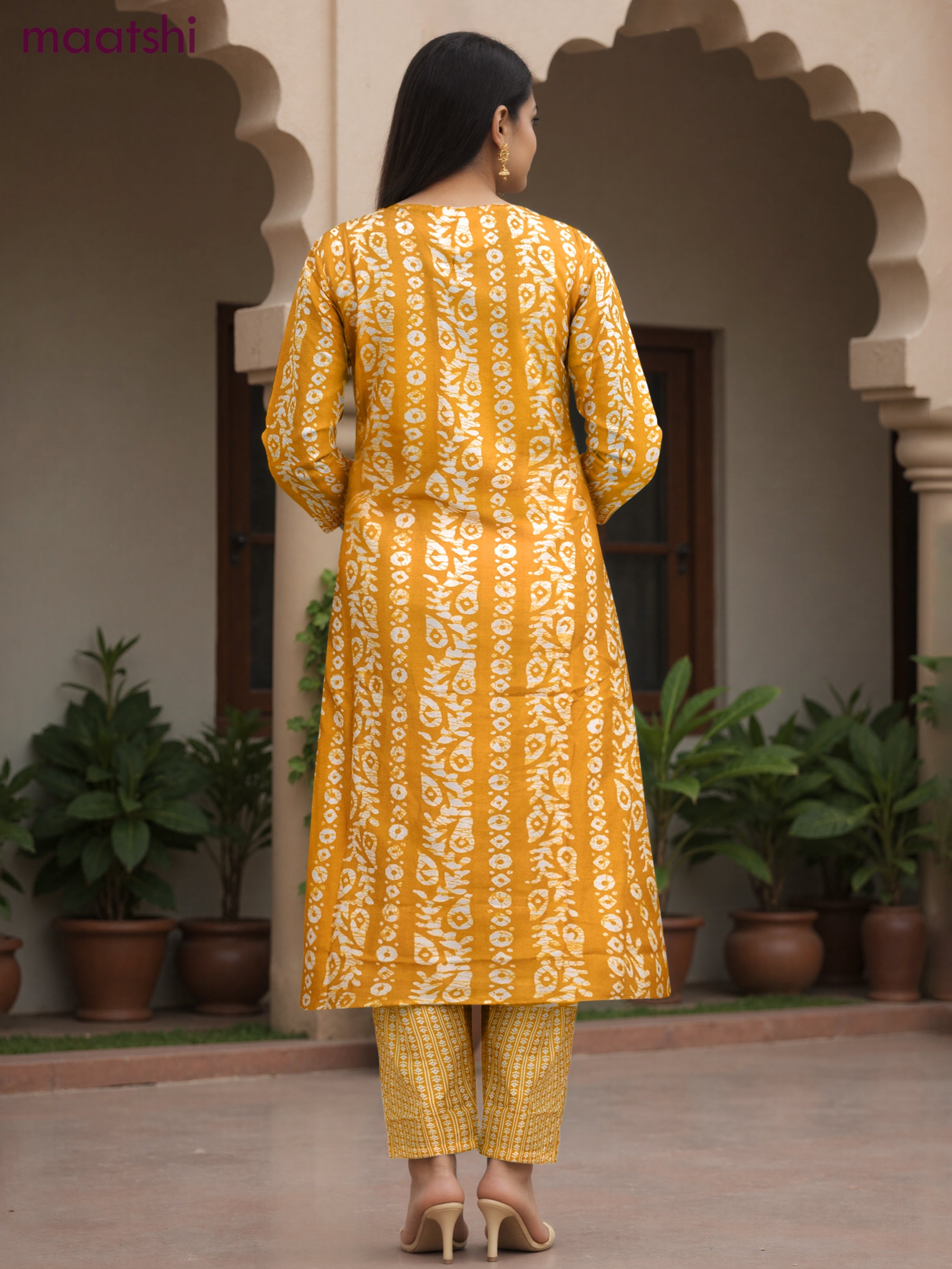 Cotton salwar suit mango yellow and off white with allover batik prints & embroidery lace work neck pattern and straight cut pant & dupatta