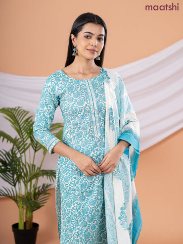 Semi cotton salwar suit cream and blue with allover floral prints & embroidery sequin work neck pattern and straight cut pant & dupatta