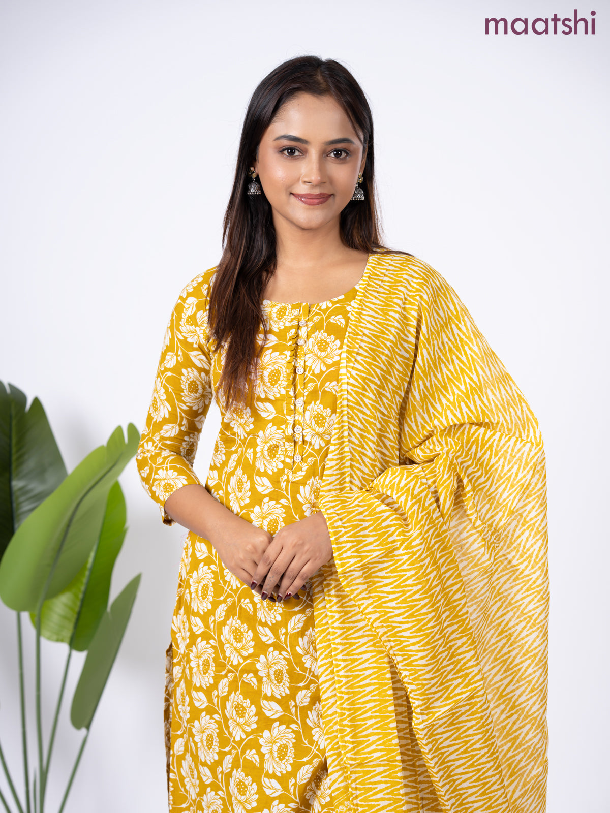 Semi cotton salwar suit mustard yellow and off white with allover floral prints & simple neck pattern and straight cut pant & dupatta