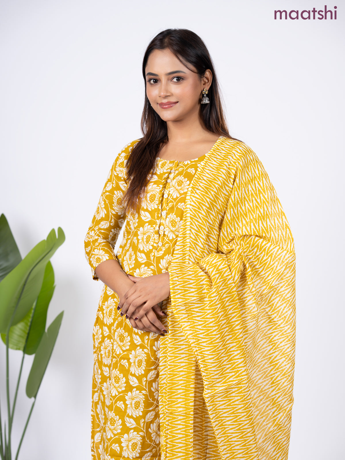 Semi cotton salwar suit mustard yellow and off white with allover floral prints & simple neck pattern and straight cut pant & dupatta