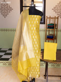 Pale Yellow and Sandal Chanderi Dress Material With Thread & Zari Buttas and Bottom & Banarasi Style Dupatta