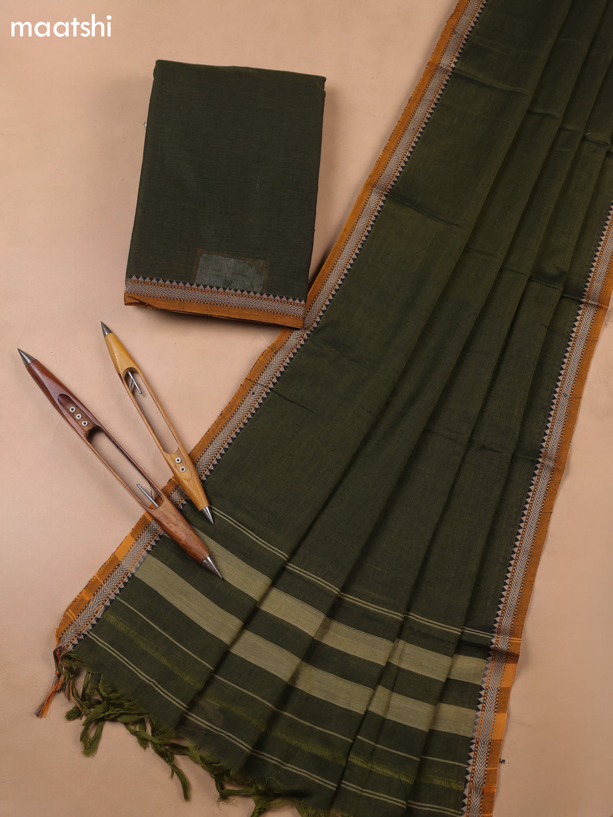 Sap Green Narayanpet Cotton Dress Materials With A Plain Body and Thread-Woven Border