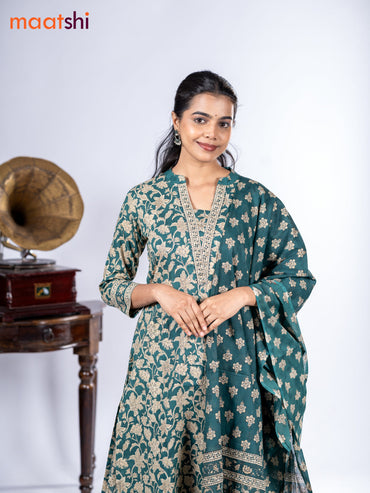 Cotton salwar suit peacock green and beige with allover kalamkari prints & sequin work neck pattern and straight cut pant & dupatta