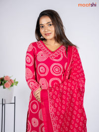 Cotton salwar suit pink with allover bandhani prints & sequin beaded work v neck pattern and straight cut pant & dupatta