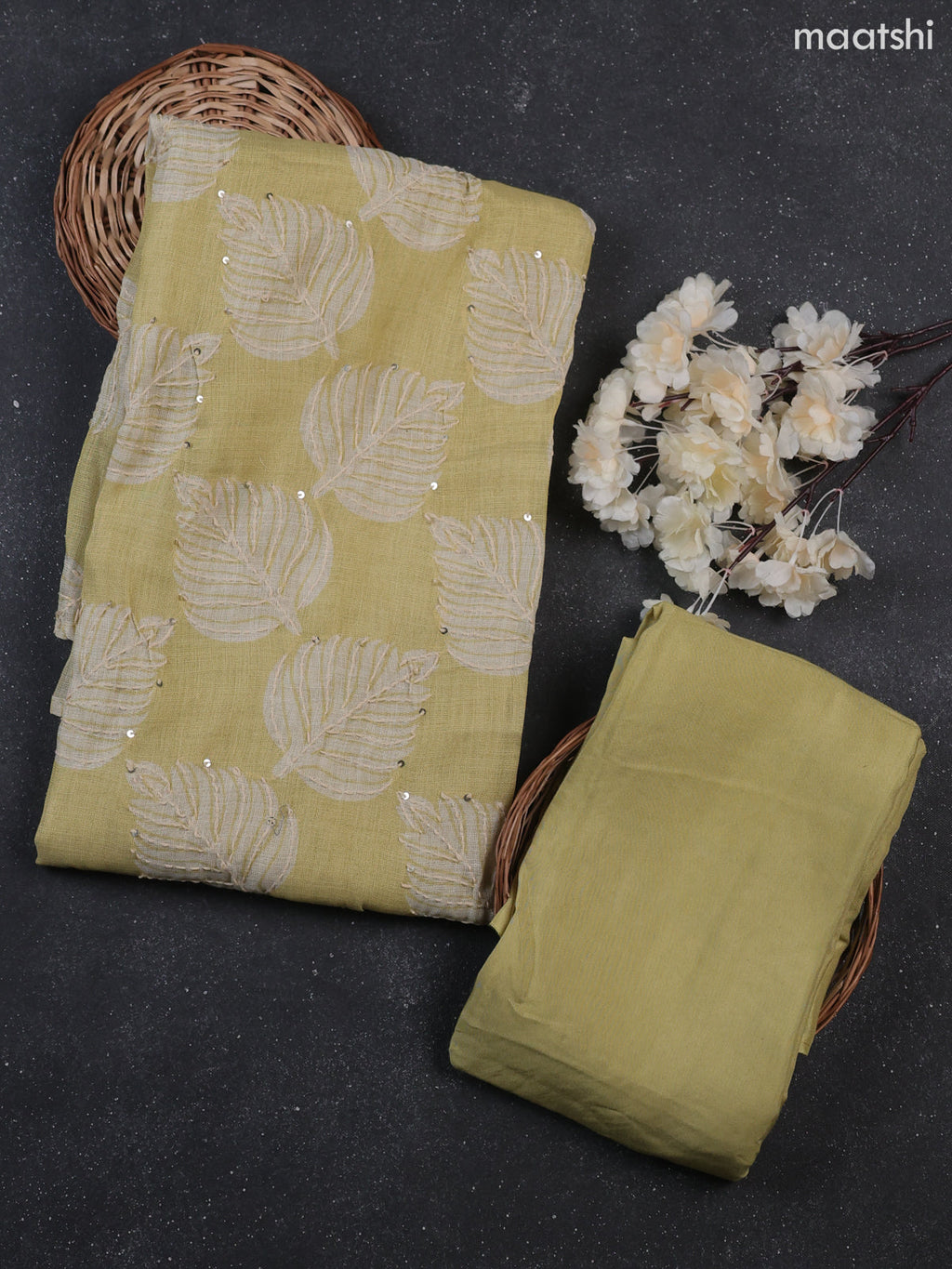 Mild Pista Green Tissue Linen Dress Material With Allover Floral Prints & Kantha Stitch Work Pattern
