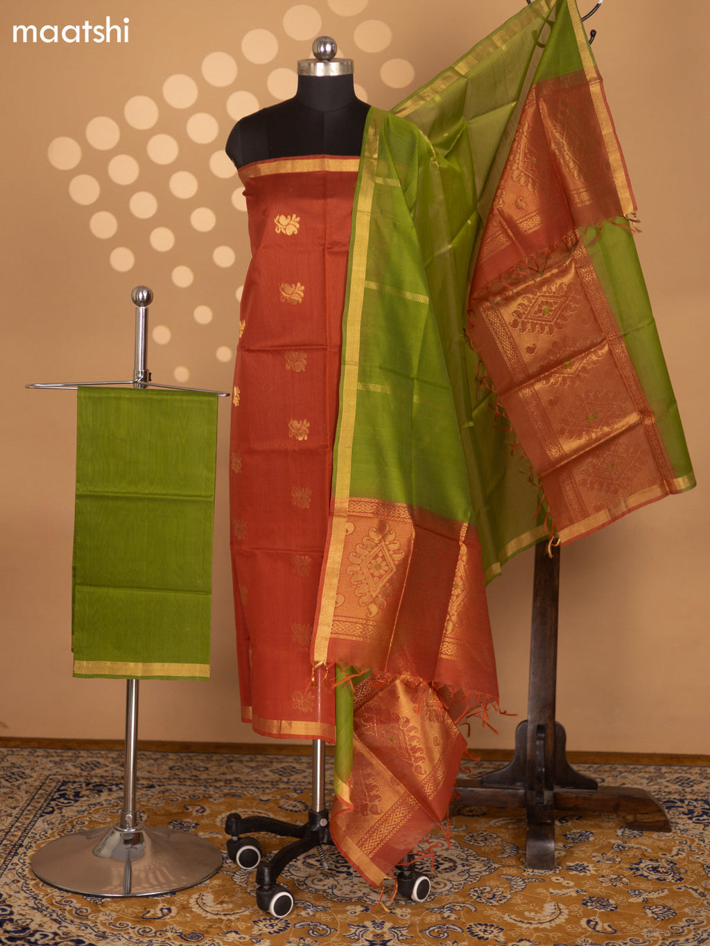 Rust Shade and Green Silk Cotton Dress Material With Zari Woven Buttas and Bottom & Zari Dupatta