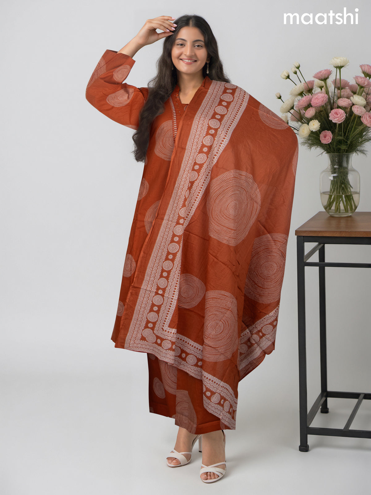 Cotton salwar suit rust shade with prints & embroidery mirror work neck pattern and straight cut pant & dupatta