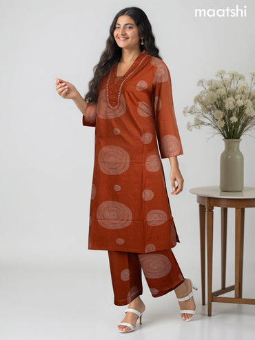 Cotton salwar suit rust shade with prints & embroidery mirror work neck pattern and straight cut pant & dupatta