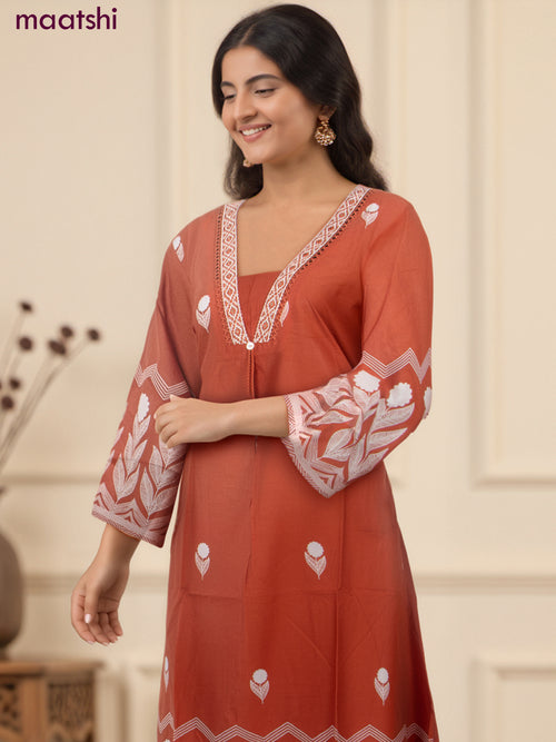 A-line salwar suit rust shade and off white with butta prints & embroidery hakoba work neck pattern and palazzo pant & dupatta