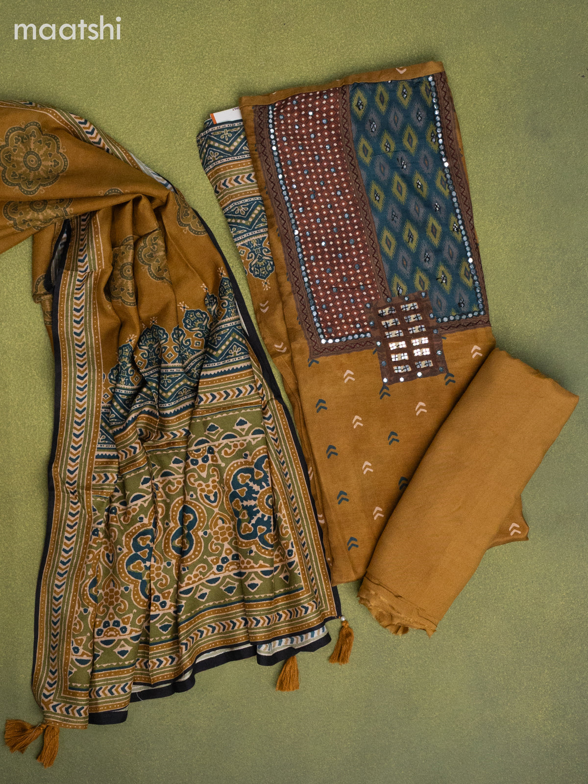 Muslin dress material dark mustard with butta prints & mirror embroidery work neck pattern and bottom & dupatta