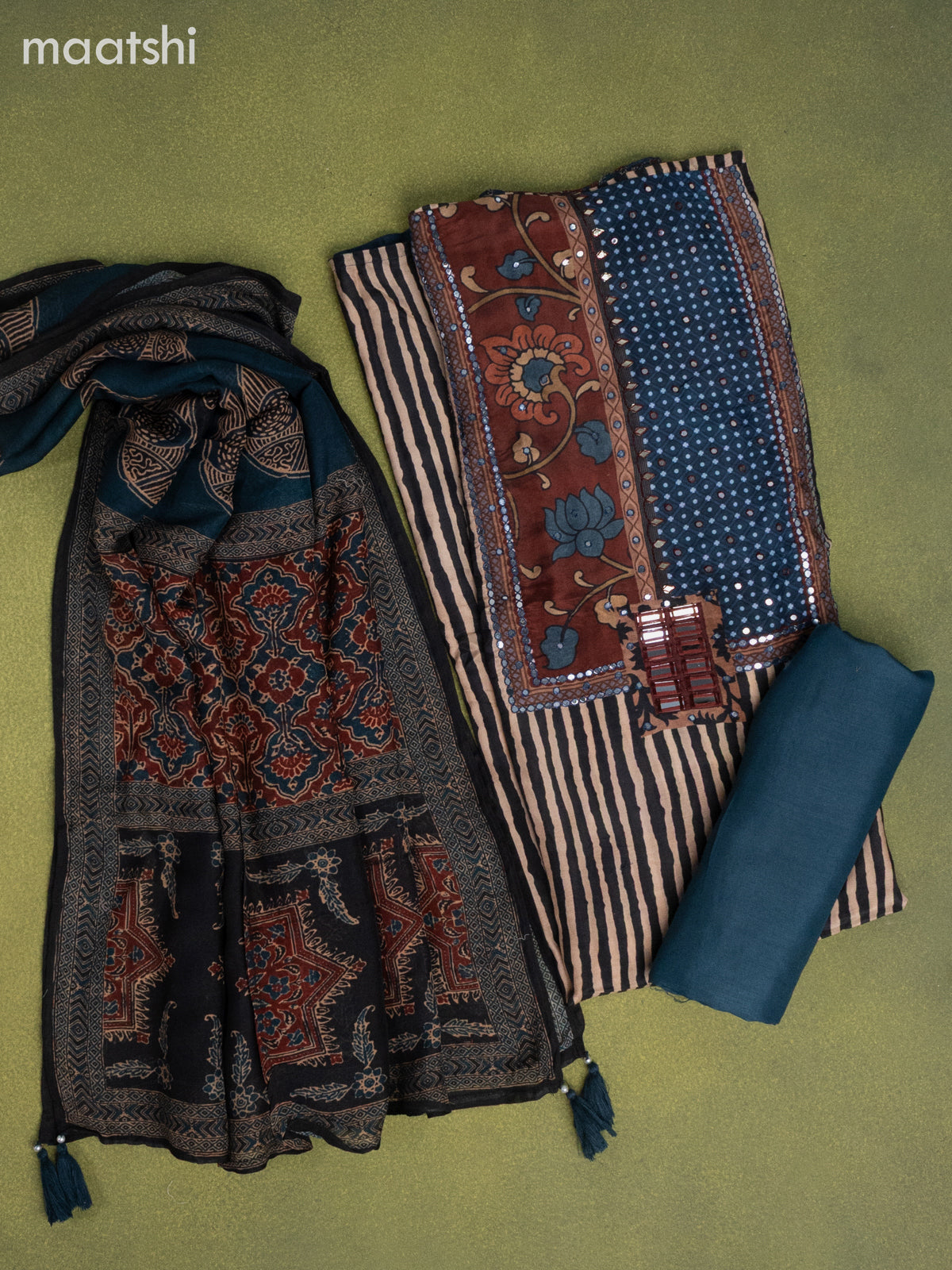 Muslin dress material peach shade and peacock blue black with allover prints & mirror embroidery work neck pattern and bottom & dupatta