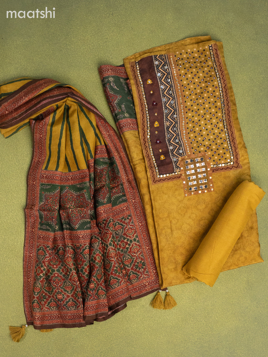 Muslin dress material mustard yellow with ajrakh prints & mirror embroidery work neck pattern and bottom & dupatta