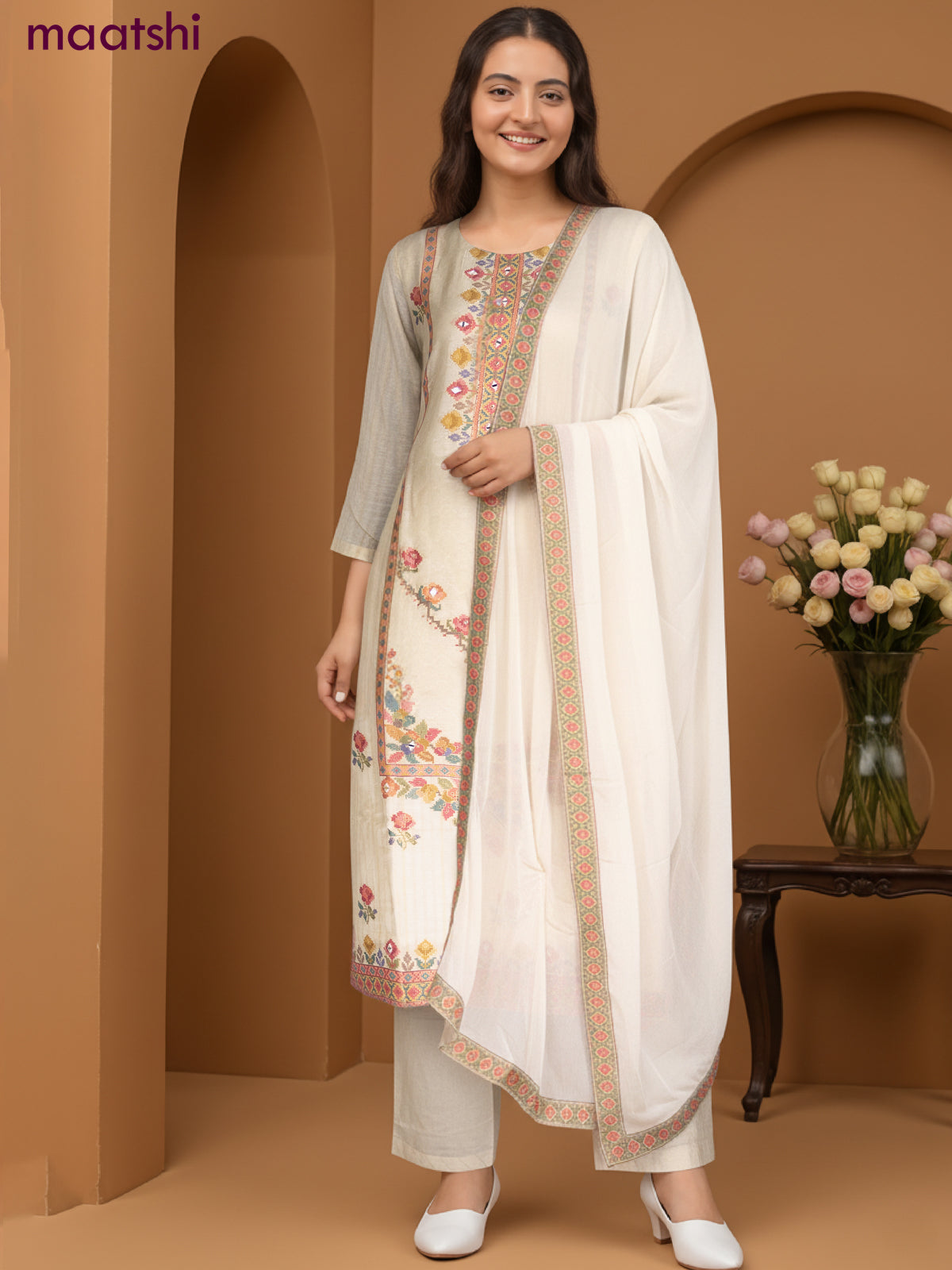 Chanderi salwar suit cream with ikat weaves & mirror work neck pattern and straight cut pant & chiffon dupatta