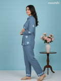 Short co-ord set pastel blue with slip & floral embroidery work buttas in top and palazzo pant
