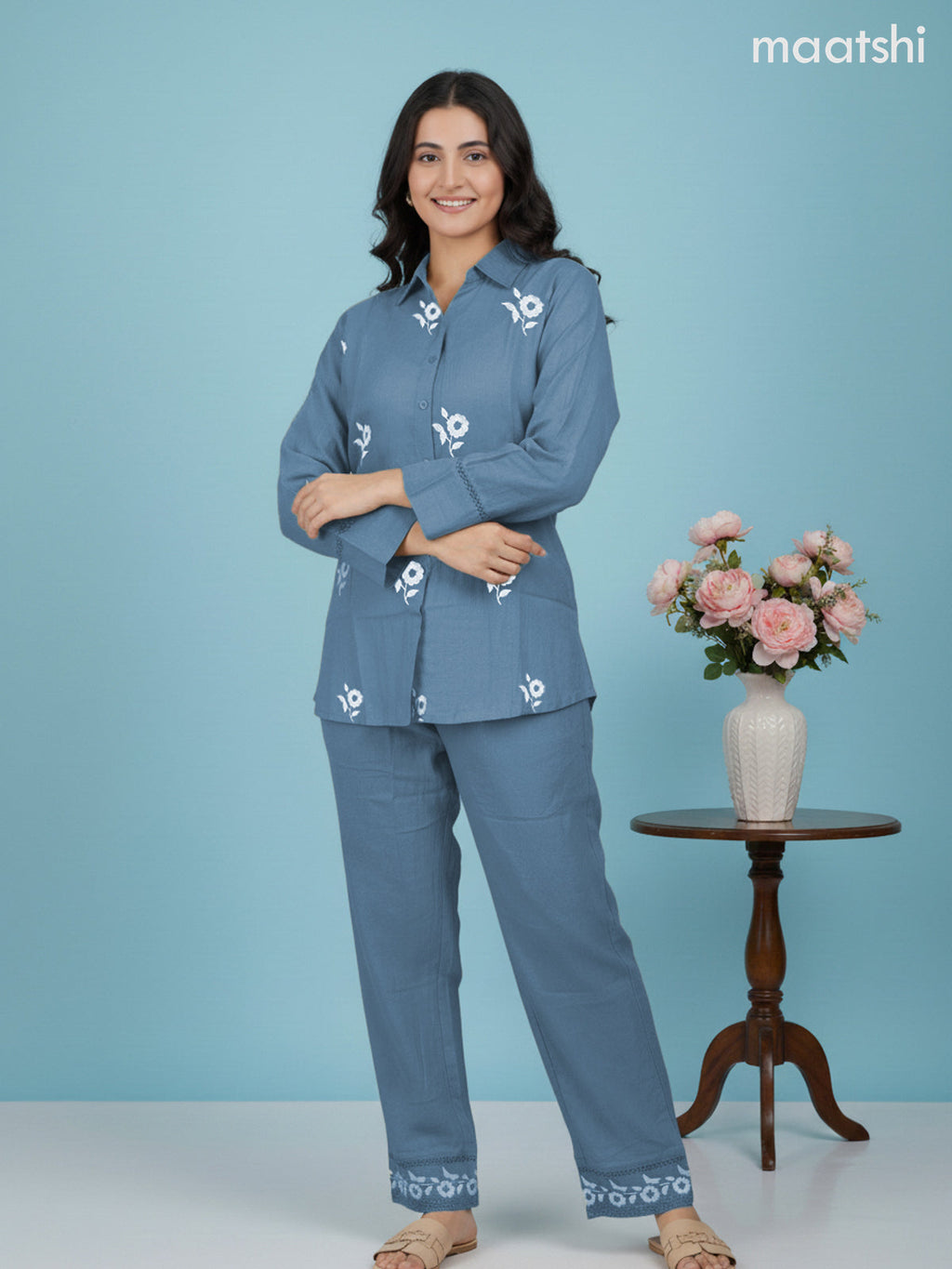 Short co-ord set pastel blue with slip & floral embroidery work buttas in top and palazzo pant