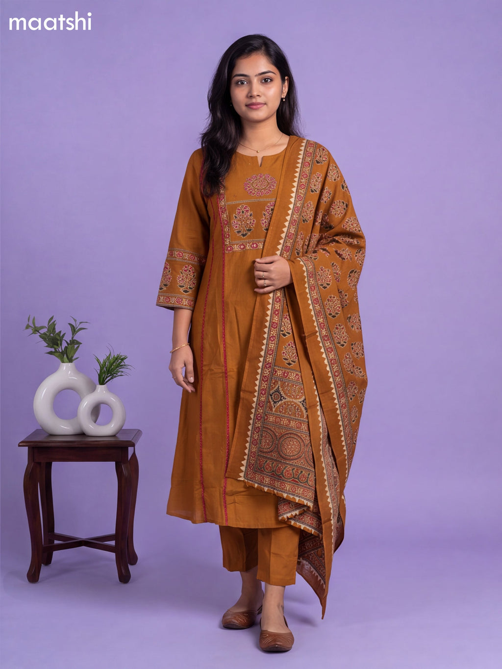 Mustard Yellow Cotton Printed & Simple Embroidery Work A-Line Suit