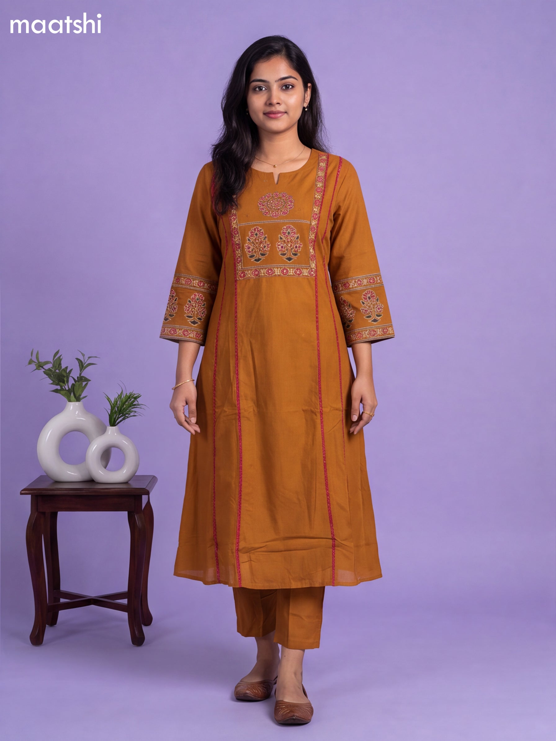 Mustard Yellow Cotton Printed & Simple Embroidery Work A-Line Suit
