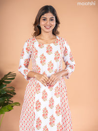 Cotton A-line kurti off white with allover floral butta prints & kantha stitch work neck pattern without pant