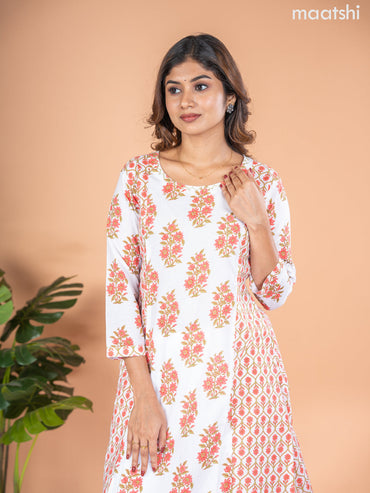 Cotton A-line kurti off white with allover floral butta prints & kantha stitch work neck pattern without pant