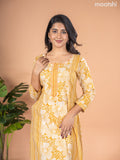 Cotton A-line kurti mustard yellow and off white with allover floral prints & kantha stitch work neck pattern without pant