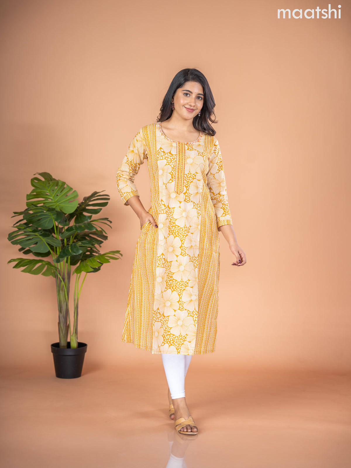 Cotton A-line kurti mustard yellow and off white with allover floral prints & kantha stitch work neck pattern without pant