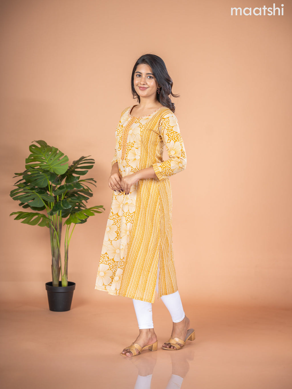 Cotton A-line kurti mustard yellow and off white with allover floral prints & kantha stitch work neck pattern without pant