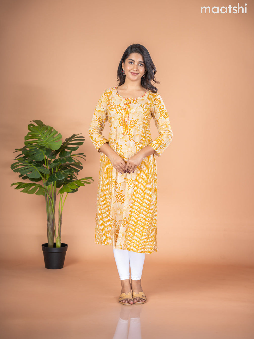 Cotton A-line kurti mustard yellow and off white with allover floral prints & kantha stitch work neck pattern without pant
