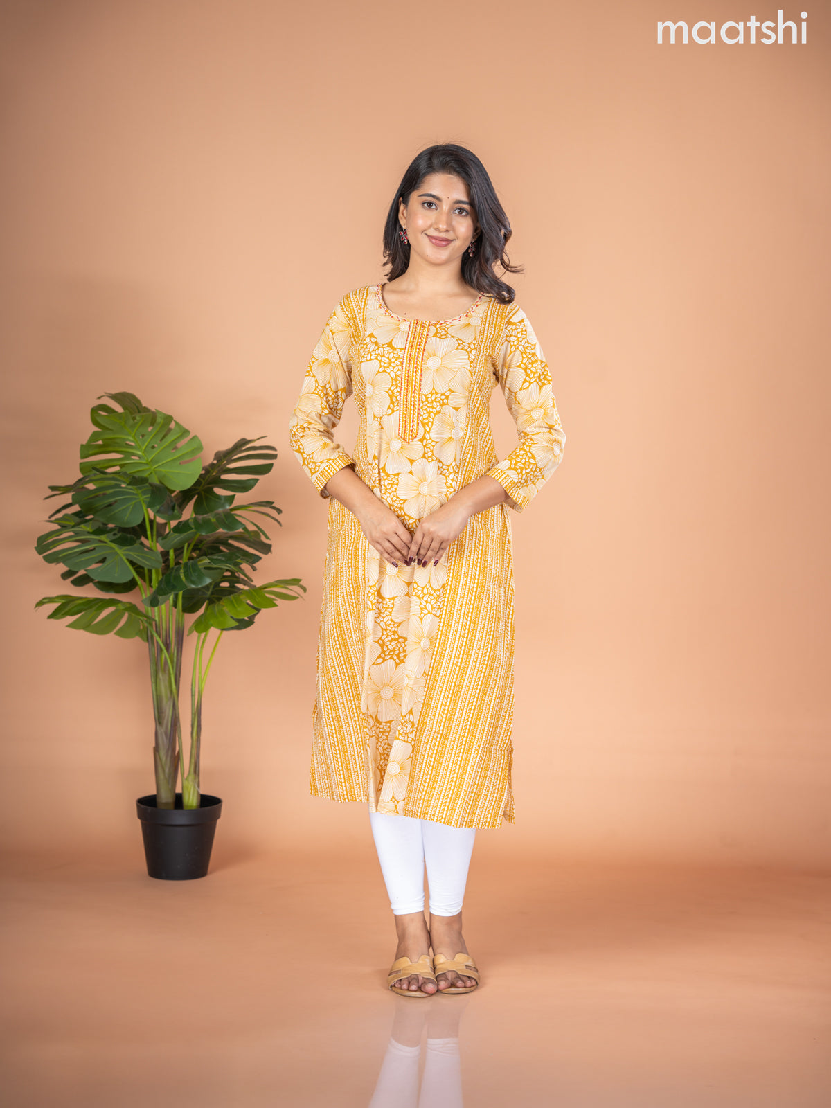 Cotton A-line kurti mustard yellow and off white with allover floral prints & kantha stitch work neck pattern without pant
