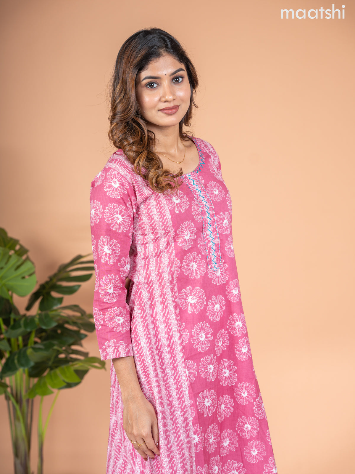 Cotton A-line kurti mauve pink with allover floral butta prints & kantha stitch work neck pattern without pant