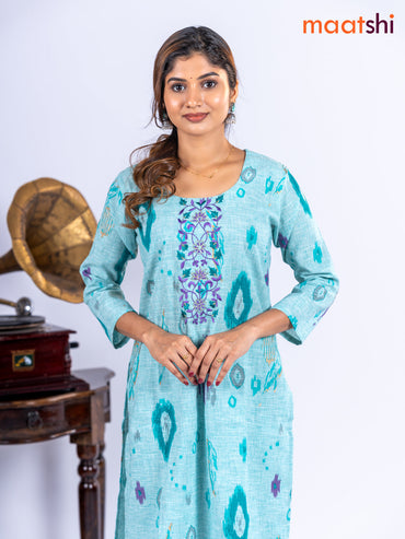 Cotton kurti set teal blue with allover ikat prints & embroidery work neck pattern and straight cut pant