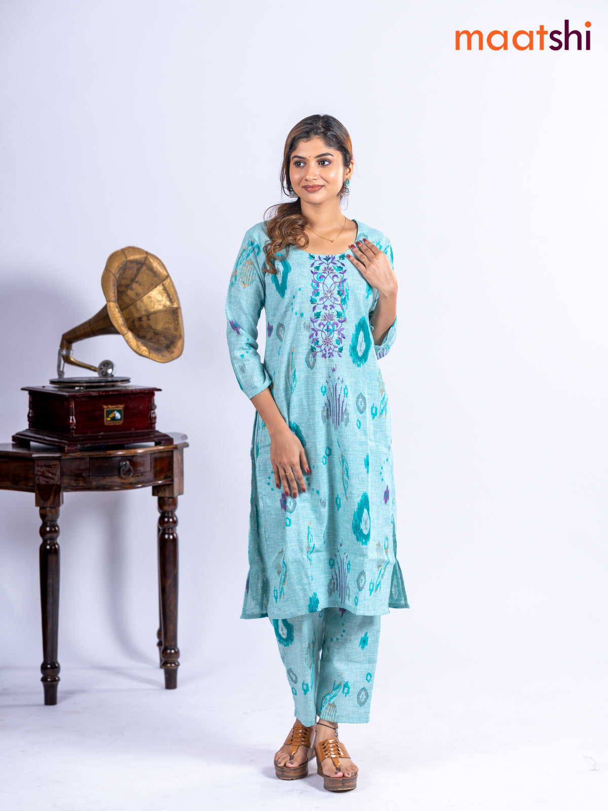 Cotton kurti set teal blue with allover ikat prints & embroidery work neck pattern and straight cut pant