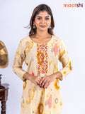 Cotton kurti set pale yellow with allover ikat prints & embroidery work neck pattern and straight cut pant