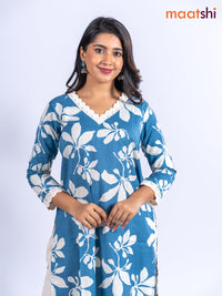 Cotton kurti set blue and off white with allover floral prints & lace work v neck pattern and straight cut pant
