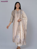 Cotton salwar suit beige with allover prints & beaded sequin work neck pattern and straight cut pant & dupatta