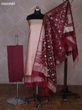 Dual Shade Of Sandal and Maroon Banarasi Silk Dress Material With Allover Zari Buttas