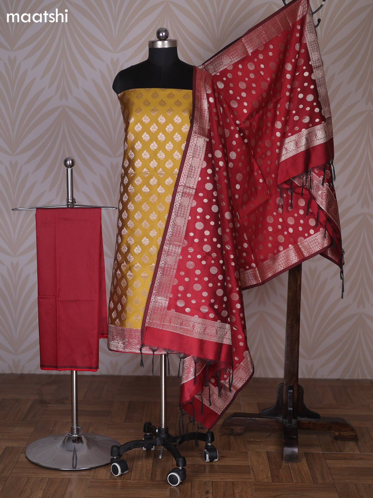 Mustrad Yellow and Maroon Banarasi Silk Dress Material With Allover Zari Buttas