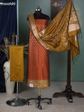 Rust Orange and Mustard Green Banarasi Silk Dress Material With Allover Zari Buttas