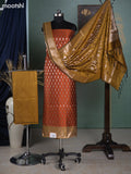 Rust Orange and Mustard Green Banarasi Silk Dress Material With Allover Zari Buttas