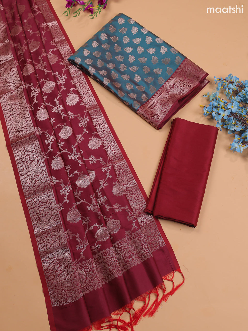 Dual Shade Of Green and Maroon Banarasi Silk Dress Material With With Allover Zari Buttas