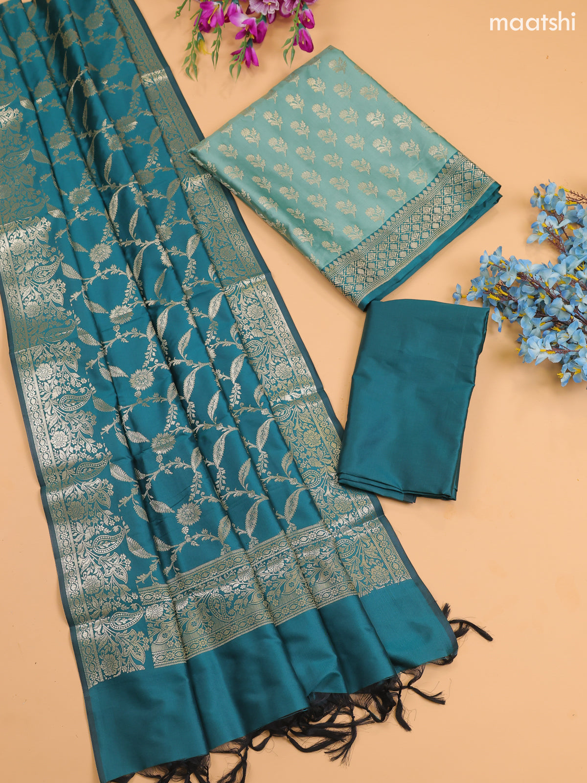 Pastel Green Banarasi Silk Dress Material With With Allover Zari Buttas