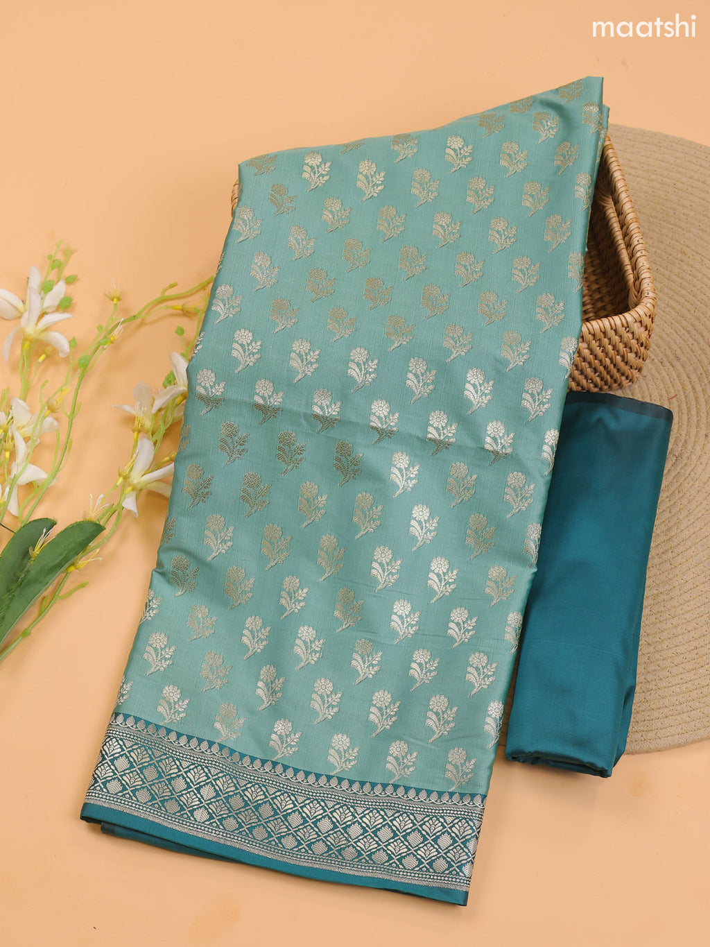 Pastel Green Banarasi Silk Dress Material With With Allover Zari Buttas