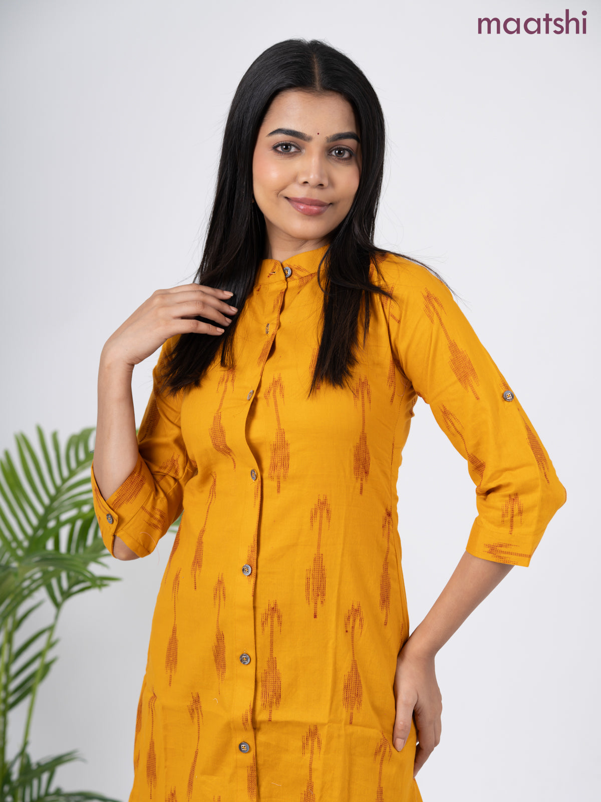 Cotton short kurti mustard yellow with allover ikat weaves & simple neck pattern without pant